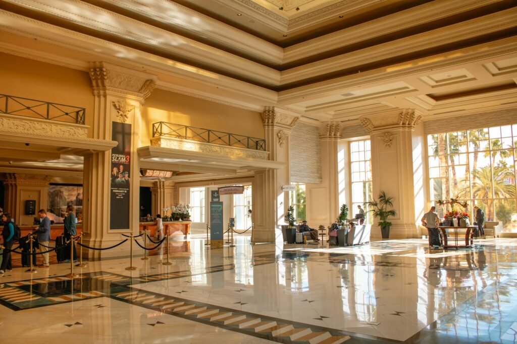 Grand hotel lobby filled with natural sunlight